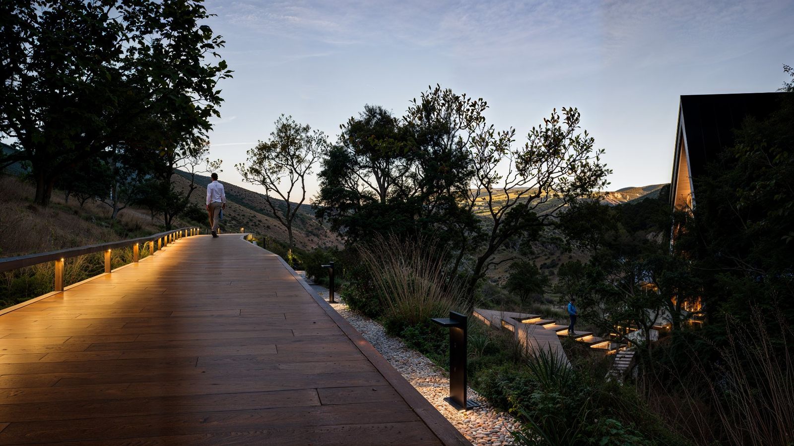 HUMANTA illuminated boardwalk trail through valley